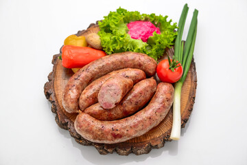 Home made sausage on a wooden board