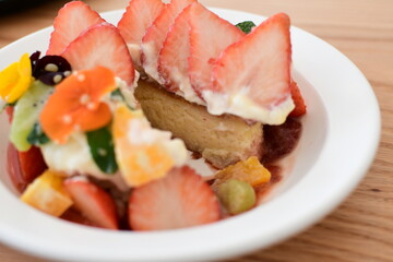 a dessert with strawberries