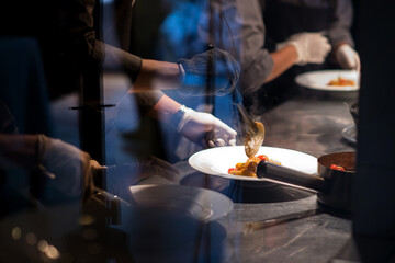 Busy kitchen with team chef