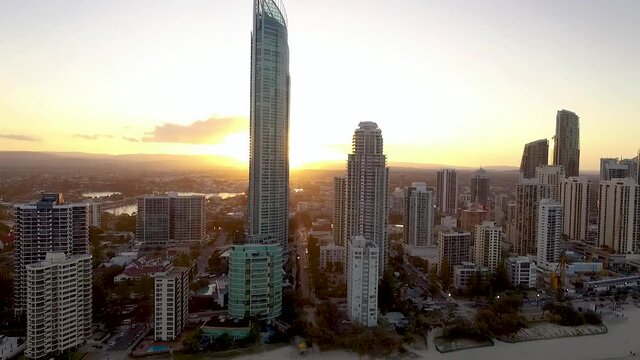 The skyline of Surfers Paradise, a seaside resort in Queensland, Australia, is seen at sunset.