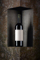 Bottle of red wine with old empty label.