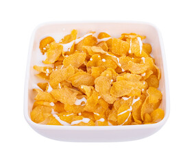 Corn flakes with milk in bowl isolated on white