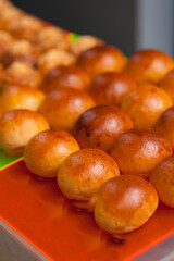 plant a lot of buns on buffet catering line