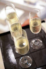 Champagne glasses on tray