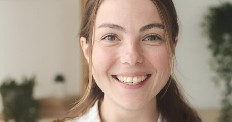 Portrait of a beautiful young woman smiling - Powered by Adobe