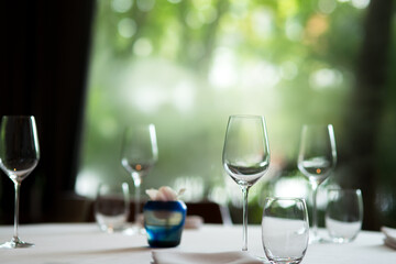 Empty glasses set on fine dining restaurant