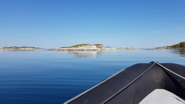 calm silent sea and small islands outside the island of Heroy, Nordland