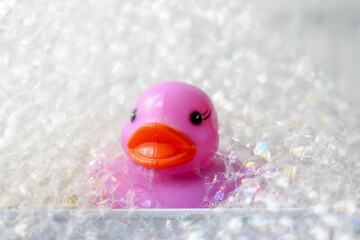 Rubber duck with bubble bath