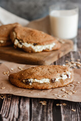 Tasty cakes with cottage cheese and raisins. Patties on a wooden table. Country style