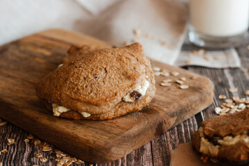 Tasty cakes with cottage cheese and raisins. Patties on a wooden table. Country style