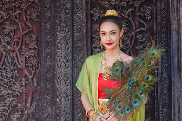 Luxury portrait of a beautiful Thai girl in traditional thai red costume, identity culture of Thailand, identity culture of Asia