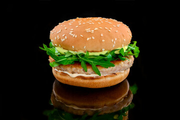 Sandwich with chicken burger, cheese and lettuce