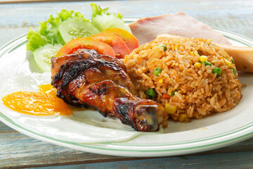 Fried rice Thai Style Served Grilled Chicken, Saucesage ,Ham and Fried Egg