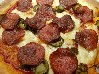 pepperoni pizza with green jalapeno