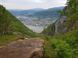 the sherpa stone stairs in mosjoen, nordland, with a view of Mosjoen city center in summer