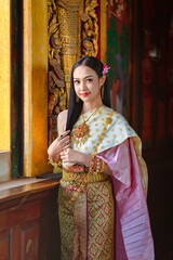 Fototapeta na wymiar Thai girl in traditional thai costume, identity culture of Thailand.
