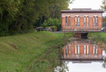 Old sluice on a canal (North Italy)