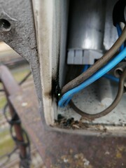 electrical wires terminals contacts bolts short circuit heated black wire

 electric arc spark point