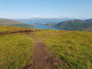Obraz premium landscape with mountains and blue sky and ocean in northern norway on the whale island