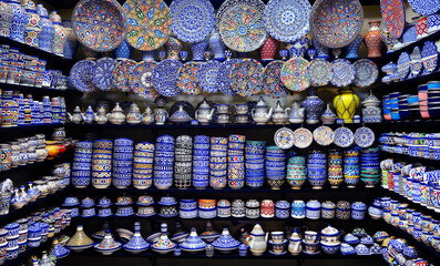 Multicolored pottery on sale in a market of Marrakech, Morocco