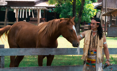 portrait of Americans Indian man with horse.