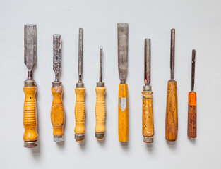 High quality old chisel / chisel set Chisel set chisel background home improvement cherry wood handicraft carpentry tradition antique wood craft expertise risk of injury training training cours