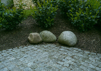 Natural background, stones, shrubs with free copy space for text.