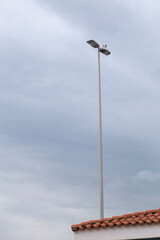 roof with streetlight, which in the highest part has a seagull