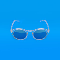 Sunglasses isolated on blue background for applying on a portrait