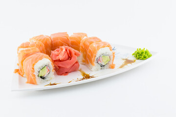 Close-up of traditional Japanese sushi on a white background. Design of the sushi bar menu. Japanese cuisine.