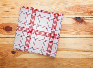 Empty wooden deck table with table cloth