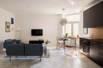 Living room, dining table and kitchen