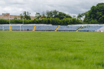 Fototapeta premium stadium, close up on grass. empty soccer football green field