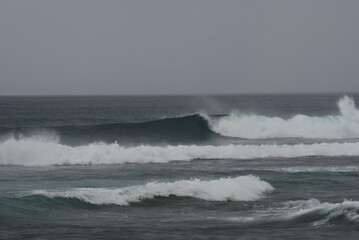 nice right hander wave at a secret spot in guam