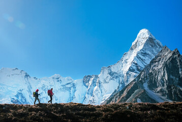 Hiking in mountains. Traveler with backpack in Nepal