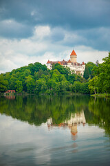 Fototapeta na wymiar Historic medieval Konopiste Castle in central Bohemia, near Prague and summer pond near, Czech Republic