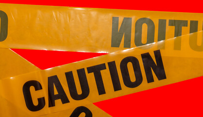 Yellow caution tapes crossing. Isolated. Red background. Protection against viruses, bacteria, and...