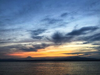 Fototapeta na wymiar sunset over the sea with Mount Fuji view.