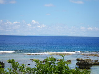 Fototapeta na wymiar pati beach, on Pati Point is the easternmost point of Guam with the view of Rota island in the background