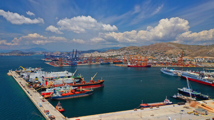 Aerial drone panoramic photo of industrial loading/unloading logistics container area of Perama, Piraeus port, Attica, Greece