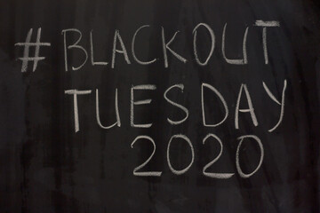 hashtag Blackout Tuesday 2020 on the blackboard background