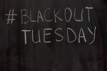 hashtag Blackout Tuesday on the blackboard background