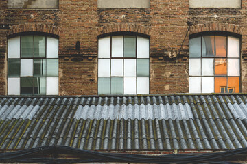 Windows and roof of an old textile factory