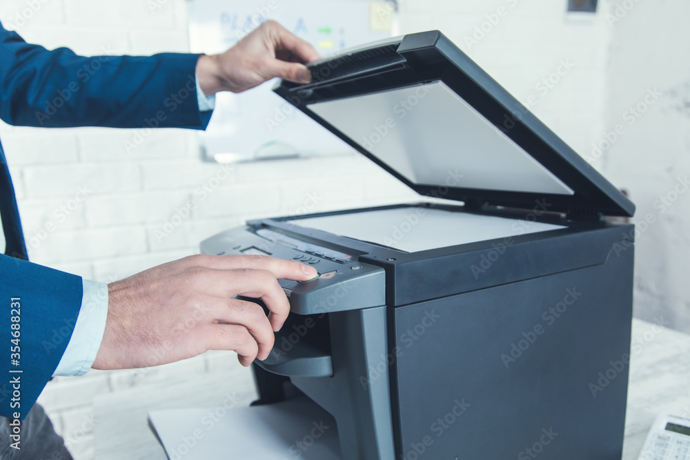 Poster man working in xerox machine