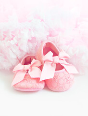 Pair of pink Baby's bootees close up