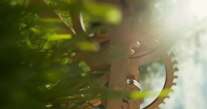 Wooden mechanism with several gears. Symbol of unstoppable nature processes. Evolution never stops. Environment is essential part of our life. Guarantine is usefull time for self-development.