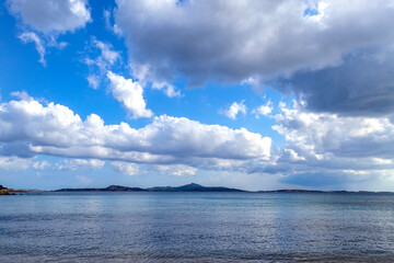 Fototapeta na wymiar Clouds on the sea near Palau (Olbia-Tempio, Sardinia, Italy).