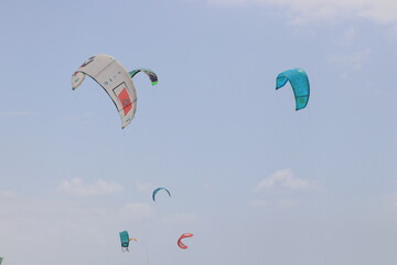 Surfing. Air wings on a background of blue sky.