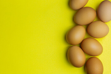 Egg, Eggs on a yellow background. Eggs in a tray 