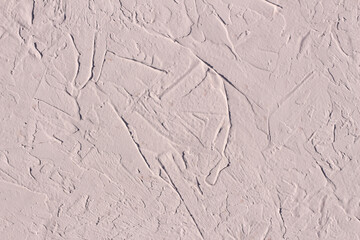 White wall with decorative plaster pattern. Abstract painted wall texture white. Structured texture